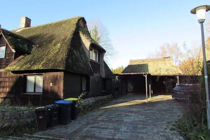 Haus unter Reet vor den Toren Kiels - Bredenbek
