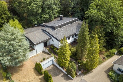 Exklusives Wohnen in bester Lage – Architektenhaus mit Wellnessbereich und großer Einliegerwohnung - Schmelz
