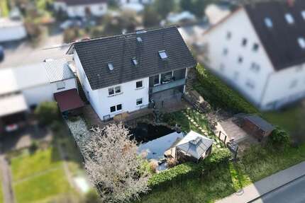 Haus zum Kaufen in Weimar Roth 649.000,00 € 268 m² - Weimar / Roth
