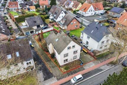 Bebautes Grundstück mit genehmigter Planung für ein Sechsparteienhaus mit geförderten Wohnungen in Gütersloh-City!