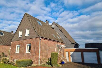 Ahlener Norden, ein Haus mit zusätzlicher Baumöglichkeit im sonnigen Garten.