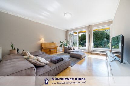 Gartenwohnung mit Split-Level-Wohnbereich und zwei Südterrassen - München