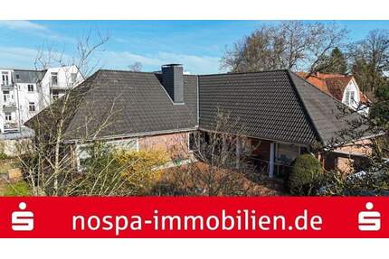 Exklusives Wohnen auf einer Ebene! Großzügiger Winkelbungalow in begehrter Lage 