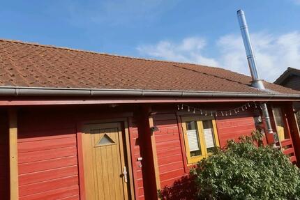 Holzhaus mit Pultdachanbau und Keller - Steinfeld