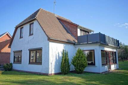 Volksbank Immobilien: Einfamilienhaus mit Einliegerwohnung auf herrlichem Grundstück - Schiffdorf Wehdel