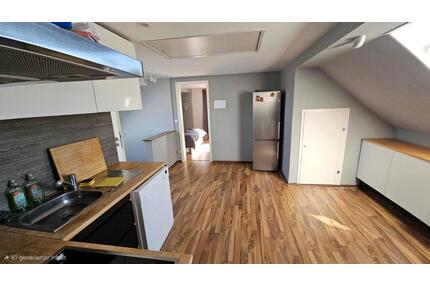 Dachgeschosswohnung 50 m2, mit ca 200 m2 eigenem Garten - Wolfsburg Ehmen