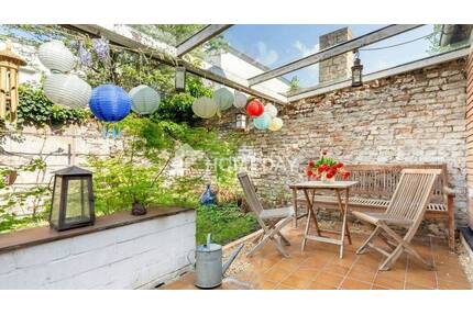 Besondere Wohnung im Bungalowstil in Neuss mit Terrasse, Garten und Photovoltaik