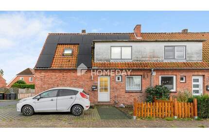 Doppelhaushälfte mit solider Basis und Südgarten - Büdelsdorf