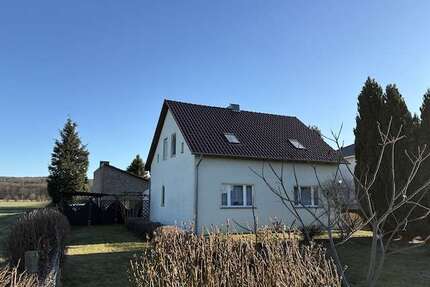 Haus zum Kaufen in Rauen 380.000,00 € 150 m²