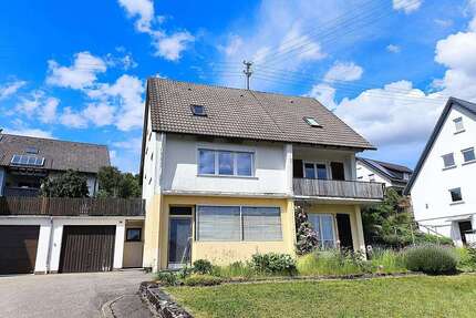 Haus zum Kaufen in Loßburg 280.000,00 € 155.18 m²