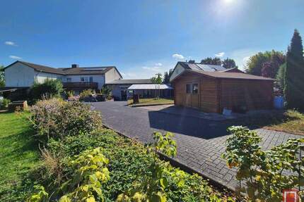 Wohnen auf einer Ebene mit Einliegerwohnung zentral und ruhig in Calden