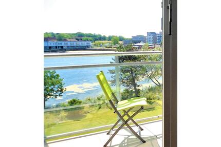 Ferienwohnung am Strand ⛱️ SW-Balkon, Seeblick, WLAN, Fahrstuhl - Heiligenhafen