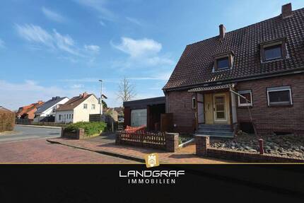 Charmante Doppelhaushälfte mit Potenzial auf tollem Endgrundstück mit Keller und Carport! - Dünsen