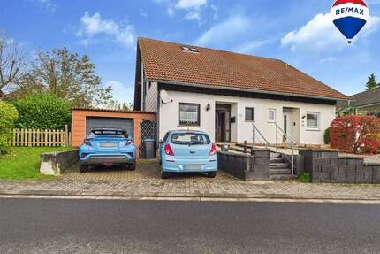 Charmante Doppelhaushälfte mit Wintergarten und Gartenparadies - Losheim am See / Niederlosheim