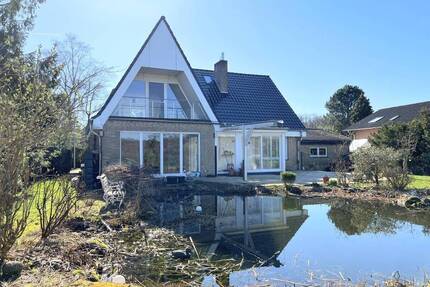 PURNHAGEN-IMMOBILIEN - Löhnhorst - Gepfl. Einfamilienhaus auf einem sehr schönen Grundstück mit Blick ins Grüne! - Schwanewede / Löhnhorst