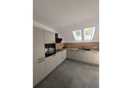 Frisch sanierte Obergeschosswohnung mit Garten und Balkon - Lübbecke