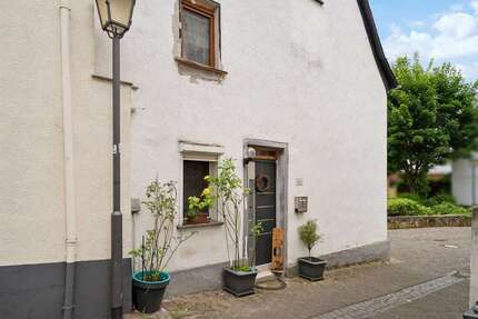 Haus zum Kaufen in Brechen 95.000,00 € 70 m²
