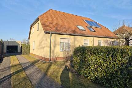 Haus zum Kaufen in Paulinenaue 285.000,00 € 125 m²