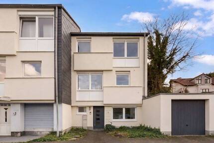 Familienglück in Metzkausen: modernisiertes Reihenendhaus mit Garten & Ausbaupotenzial - Mettmann
