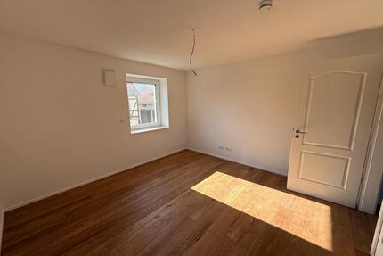 Modernes Wohnen im Grünen: Helle 2-Zimmer-Wohnung (Erstbezug) - Spangenberg