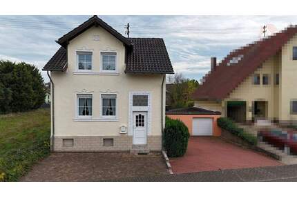 Gepflegtes Häuschen mit tollem Garten in bester Lage. - Schwalbach