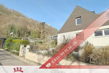 Trier-West: Solides Haus mit Traumgarten und großem Keller