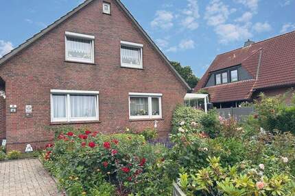 Flexibel nutzbares Zweifamilienhaus mit tollem Garten und Garage in gefragter Lage von Hooksiel! - Wangerland