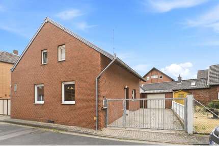 Haus zum Kaufen in Rommerskirchen Evinghoven 295.000,00 € 123.7 m² - Rommerskirchen / Evinghoven