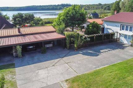 Direkt am See: Gepflegtes 4-Zi.-Zuhause mit einzigartigem Grundstück, Bootssteg und Einliegerwhg. - Krakow am See Bossow