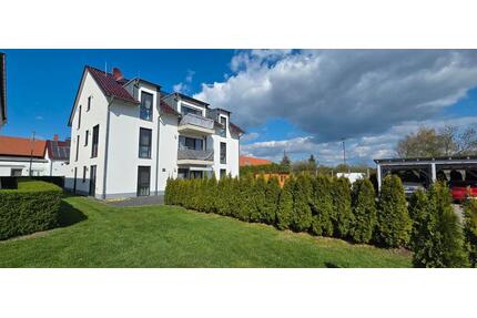Moderne und Helle 4 Zimmerwohnung im EG mit Terrasse - Dachwig