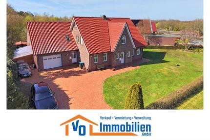 Urlaubsfeeling inklusive: Wohnhaus mit Einbauküche, Garten & Garage am Großsander Badesee - Uplengen