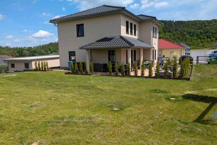 Einfamilienhaus Typ Stadtvilla im Baugebiet 