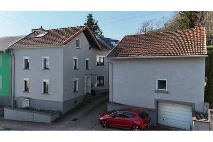 Haus, Garten und Garage. Zwar getrennt voneinander, dennoch bezugsfertig. - Besseringen