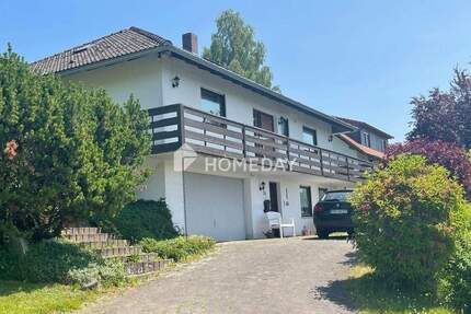 Attraktives Einfamilienhaus mit Einlieger-Fewo, Hanglage, Doppelgarage & großem Grundstück - Gersfeld Sandberg