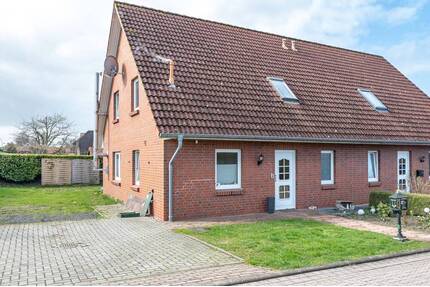 Wohnen mit Wohlfühlfaktor: Familienfreundliche Doppelhaushälfte mit Garten und Kamin - Drochtersen Ritsch