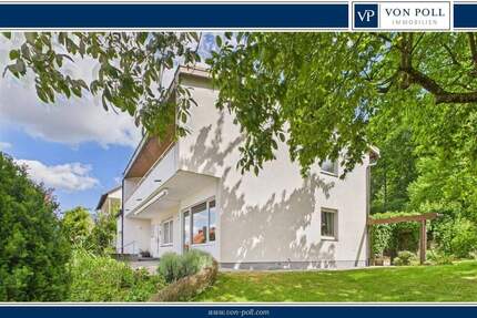 Gepflegtes EFH mit tollem Garten und schönem Blick über Dittelbrunn. Optional mit zweitem Grundstück