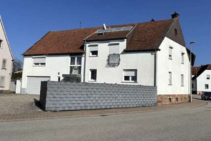 Haus zum Kaufen in Bruchmühlbach-Miesau 320.000,00 € 235 m²
