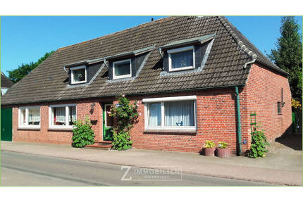 Nahe dem Ortskern mit idyllischem Garten** - Oldenswort