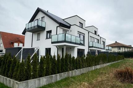 Stilvolle Dachgeschosswohnung mit Neubaukomfort, Balkon und Tiefgarage - Rietberg