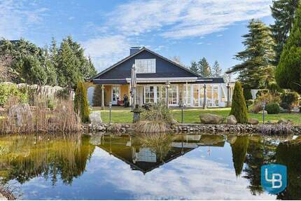 Einzigartiges Wohnen auf weitläufigem Traumgrundstück - Exklusives Einfamilienhaus mit Schwimmteich - Ahrensbök / Gnissau