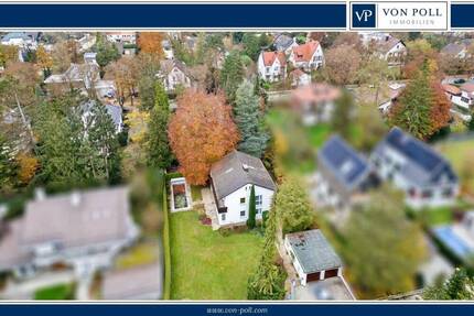 Charmantes Einfamilienhaus in begehrter Lage von Gräfelfing mit Südgarten und Pool