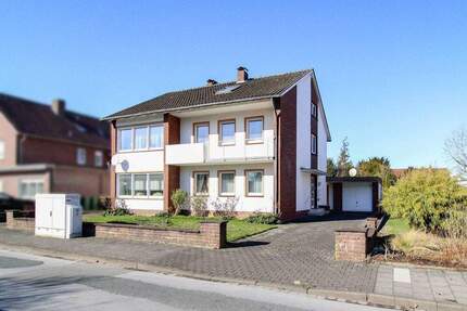 Zweifamilienhaus mit zwei Garagen und großem Garten in guter Lage von Rheda - Rheda-Wiedenbrück