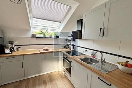 Helle Dachgeschosswohnung mit Südwestbalkon in Siegen-Weidenau