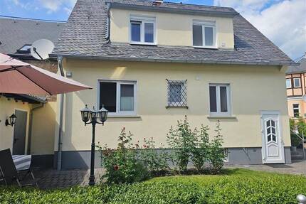 Stilvolles Rheininselhaus mit Garten, Garage & Rheinblick - kernsaniertes Zuhause auf Niederwerth