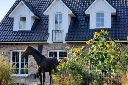 Einfamilienhaus im Friesenstil mit Doppelgarage und Garten - Neu Wulmstorf