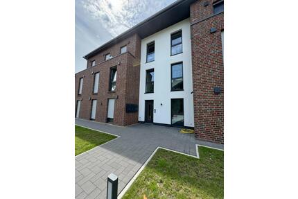 Moderne Neubauwohnung mit Balkon im Ortskern-Ostrhauderfehn