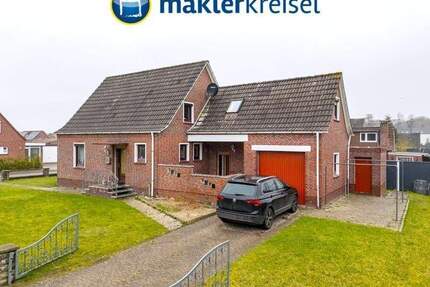 Solides Siedlungshaus mit Garage und Werkstatt in ruhiger Wohnlage! - Dornum