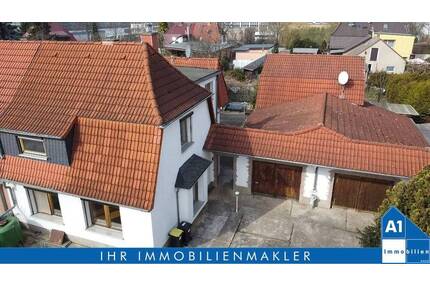 Heimstädten-Siedlung - Einfamilienhaus mit Doppelgarage, Kamin und Nebengelass in Halle (Saale)