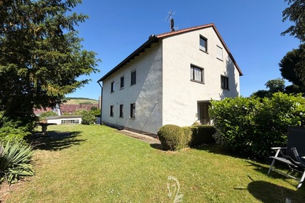 Wohnen und Vermieten in Zell am Main – großzügiges Zwei- bis Dreifamilienhaus mit Garten