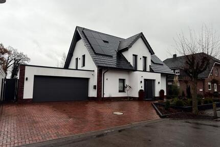 Modernes Einfamilienhaus mit Doppelgarage und Wintergarten - Bersenbrück